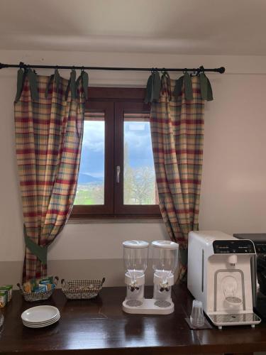 Kuchyň nebo kuchyňský kout v ubytování Villa del Colle Bevagna