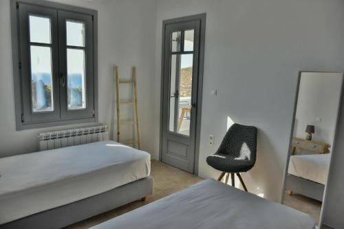 Ένα ή περισσότερα κρεβάτια σε δωμάτιο στο Relaxia Estate Naxos By KB Hospitality