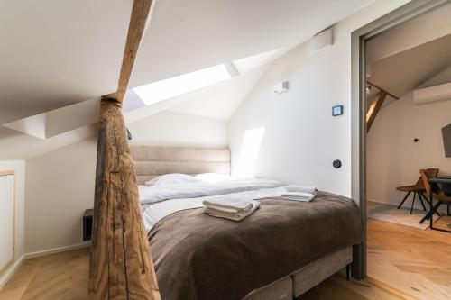 a bedroom with a hammock bed in a loft at N48 Boutique Hotel in Tallinn
