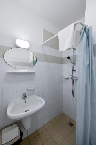 Koupelna v ubytování Campus Hotel