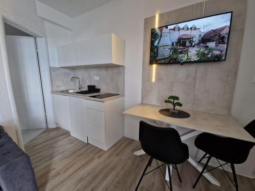 Cuisine ou kitchenette dans l'établissement Elegance Dream Apartment