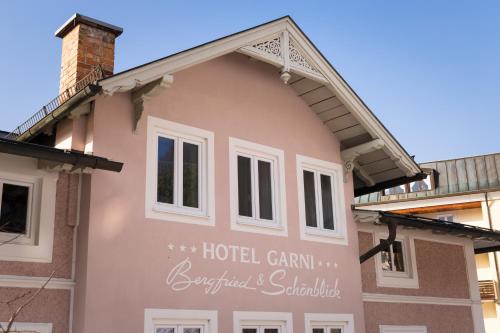 a building with a hotel grant sign on it at Hotel Bergfried & Schönblick in Bad Reichenhall