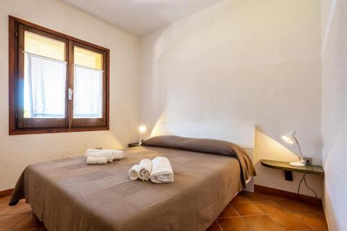 Llit o llits en una habitació de Residence Bellavista-INFINITYHOLIDAYS