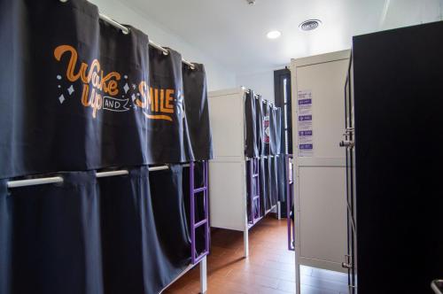 a row of lockers in a locker room at Kabul Party Hostel Barcelona in Barcelona