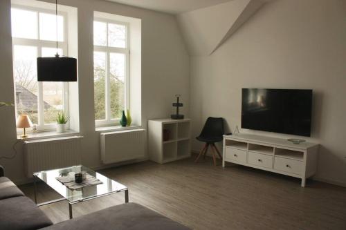 TV a/nebo společenská místnost v ubytování Villa Nordlicht