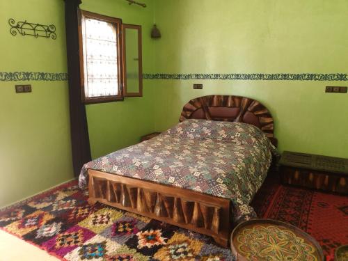 Ένα ή περισσότερα κρεβάτια σε δωμάτιο στο Gite DAR UL