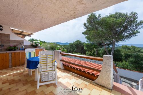 - une vue depuis le balcon d'une maison dans l'établissement Apartments Casa Vacanze Porto Pino, à Porto Pino