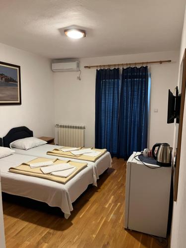 Krevet ili kreveti u jedinici u okviru objekta Apartmani Goran i Jelena Zec