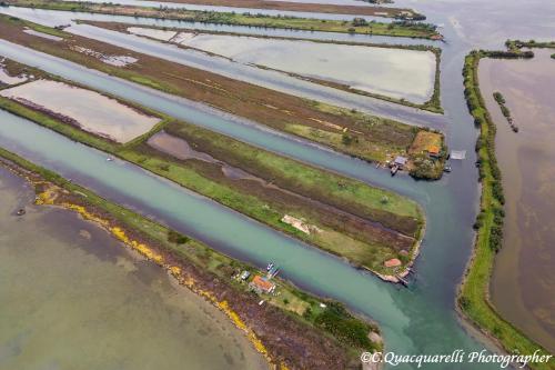 an aerial view of a group of islands in the water at I TREPPONTI in Comacchio