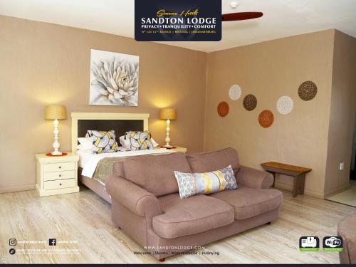 a bedroom with a bed and a couch and a bed at Sandton Lodge Rivonia in Johannesburg