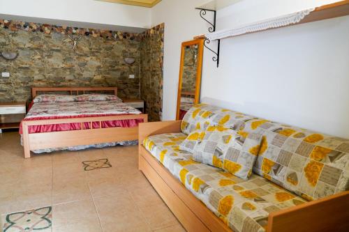 Ένα ή περισσότερα κρεβάτια σε δωμάτιο στο Casa Giusi