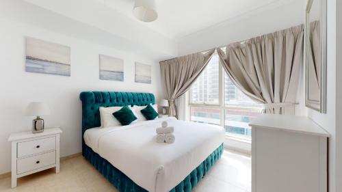 Postel nebo postele na pokoji v ubytování Key View - Al Majara