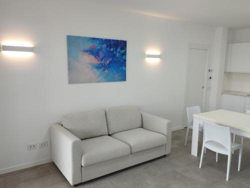 Ruang duduk di Opalia Residence - Wonderful Garda Lake view Apartment
