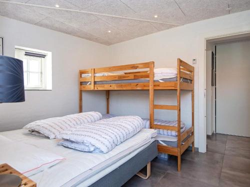 Postel nebo postele na pokoji v ubytování 8 person holiday home in Odder-By Traum