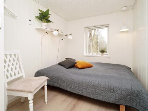 Katil atau katil-katil dalam bilik di Holiday home Slagelse XVIII