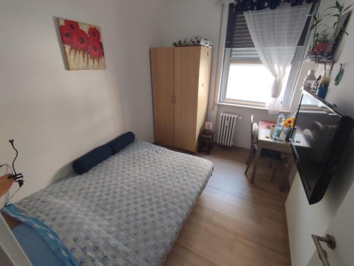 A bed or beds in a room at Tramway Easy Private Rooms - Casa all'Italiana