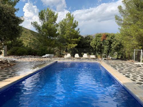 Piscina de la sau aproape de Casas Rurales Cortijo Cerro Fuentes Nuevas