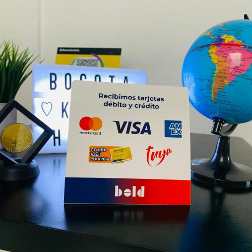 a sign on a table with a globe on it at Bogotá Kings 302 in Bogotá