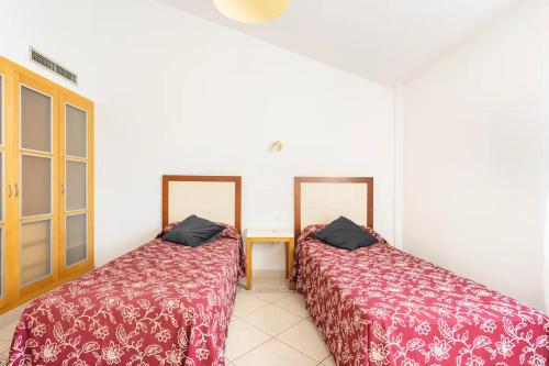 Postel nebo postele na pokoji v ubytování Villa La Orotava