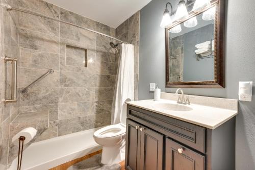 a bathroom with a sink and a toilet and a tub at Clear Lake Vacation Home Rental - Pet Friendly! in Clear Lake
