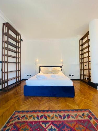 ELEGANT ROOMS PARIOLIにあるベッド