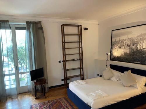 ELEGANT ROOMS PARIOLIにあるベッド