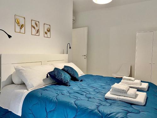 Postel nebo postele na pokoji v ubytování Cava Home - Castelli Apartments