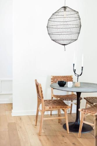 a dining room with a table and chairs at Contigo Ranch Fredericksburg in Fredericksburg
