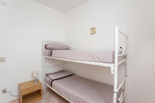 Postel nebo postele na pokoji v ubytování Casa con giardino