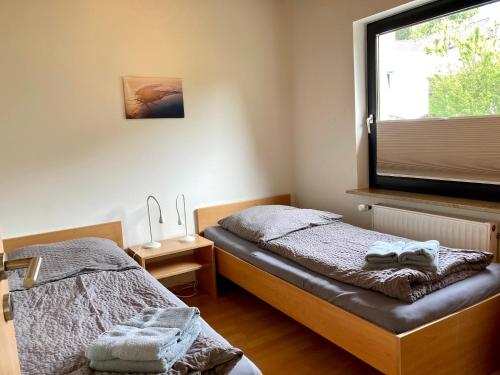 Кровать или кровати в номере Haus Wilhelmi Wilhelmi Whg 2