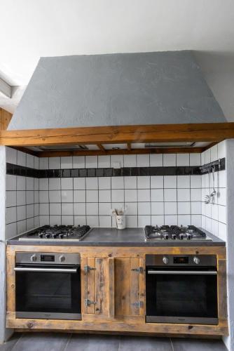 Kuchyň nebo kuchyňský kout v ubytování Gîte 4 à 10 pers