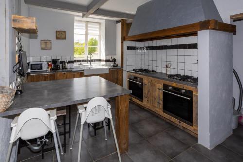 Kuchyň nebo kuchyňský kout v ubytování Gîte 4 à 10 pers