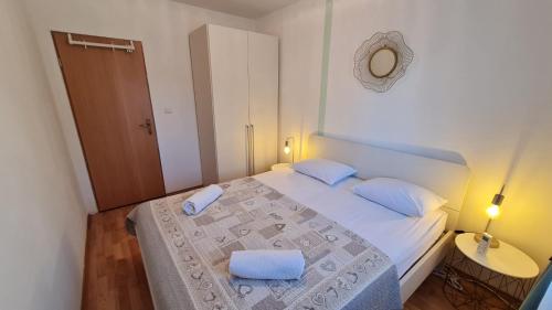 Ένα ή περισσότερα κρεβάτια σε δωμάτιο στο Villa Nagi