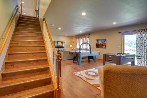 a staircase in a house with a sink and a bathroom at Expansive Retreat on 5 Acres in Shakopee! in Shakopee