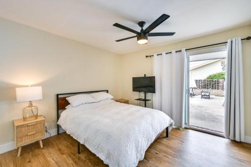 a bedroom with a bed and a ceiling fan at Pet-Friendly San Diego Studio about 14 Mi to Downtown in San Diego