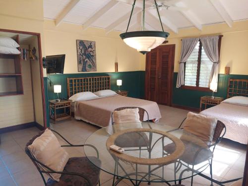 Postel nebo postele na pokoji v ubytování Playa Negra Guesthouse