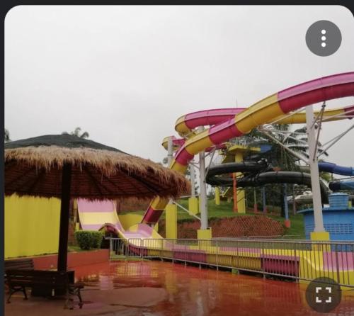 a water park with a roller coaster at Rosnah Homestay in Kampong Ayer Resam