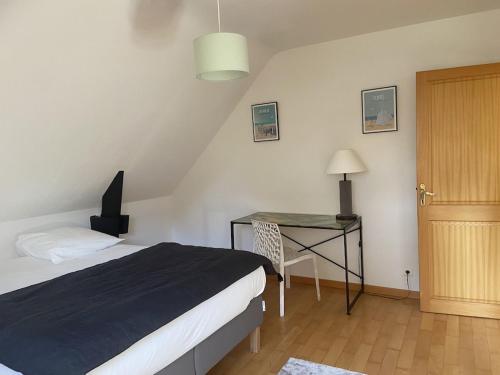 Postel nebo postele na pokoji v ubytování Maison Spacieuse à Proximité des Plages de la Baule
