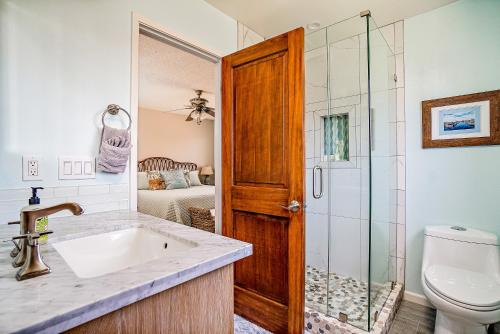 a bathroom with a sink and a shower and a toilet at Verdon Oasis in Morro Bay