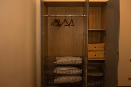 a walk in closet with folded towels in it at "Chez Riche" Luxury serviced apartment 12 in Cairo