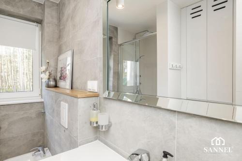 Ванная комната в Apartament Green View - Pobierowo Baltic Apartments