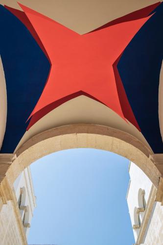 a red star on the top of a building at Distilia Dimora Salentina in San Cesario di Lecce