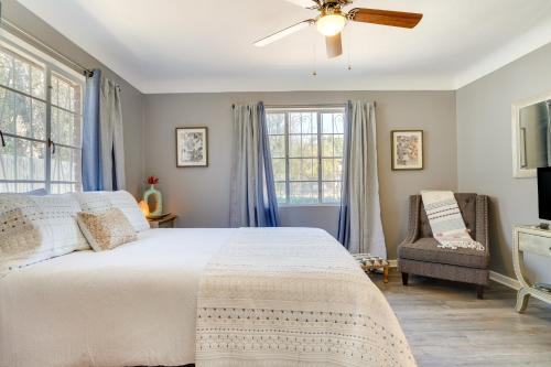 a bedroom with a bed and a ceiling fan at Single-Story Retreat about 1 Mi to Downtown Tucson! in Tucson