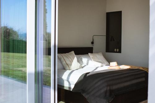 Ένα ή περισσότερα κρεβάτια σε δωμάτιο στο Residenza Cavaion