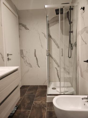 a bathroom with a shower and a sink at B&B Mini Hotel Incity-close train station and port- in Salerno