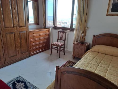 Postel nebo postele na pokoji v ubytování S'Altura, dall'alto di Nuoro