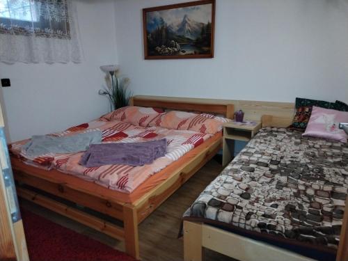 Ένα ή περισσότερα κρεβάτια σε δωμάτιο στο Dom u Jozefa