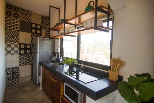 Η κουζίνα ή μικρή κουζίνα στο Villas Pura Chacala