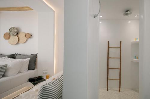 Postel nebo postele na pokoji v ubytování Naxos Hotel Poseidon