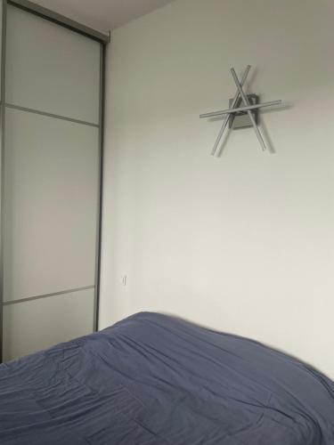 Posteľ alebo postele v izbe v ubytovaní Chambre à louer 1 à 2 personnes chez l'habitant